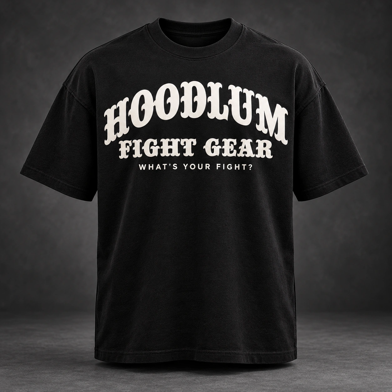 HOODLUM Identity Heavyweight Tee concept with the official logo and What’s Your Fight slogan