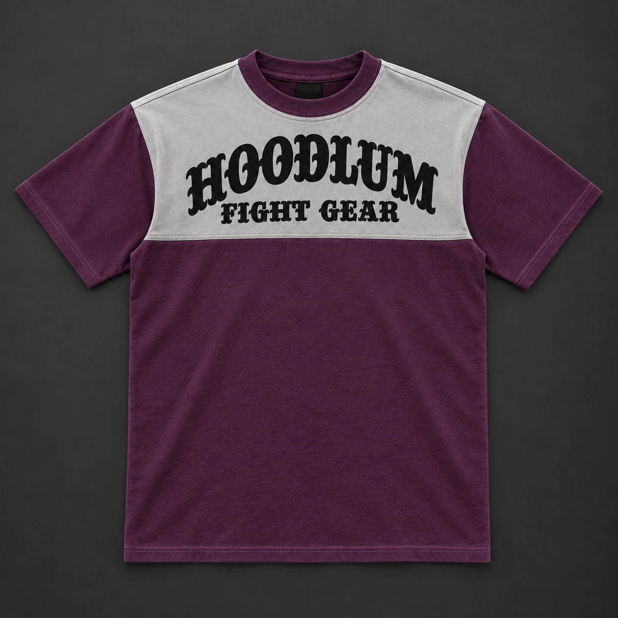 Arena Contrast Tee — Plum / Pewter — Flat-lay view (AI demo concept)