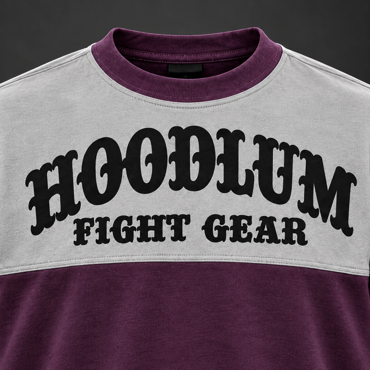 Arena Contrast Tee — Plum / Pewter — Branding detail (AI demo concept)