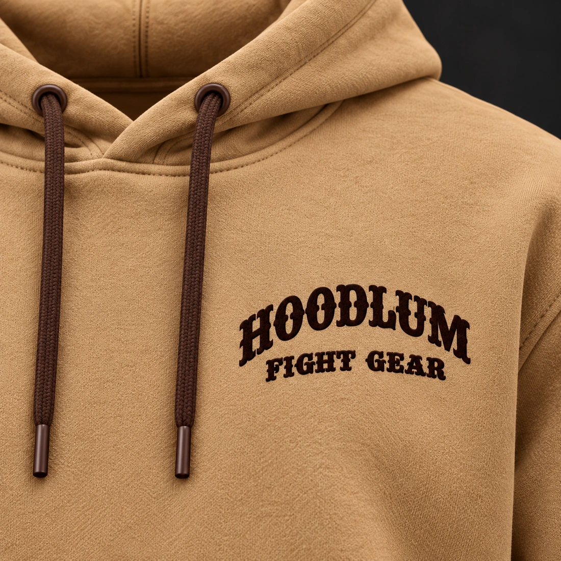 Beyond the Ring Hoodie — Camel / Espresso — Branding detail (AI demo concept)