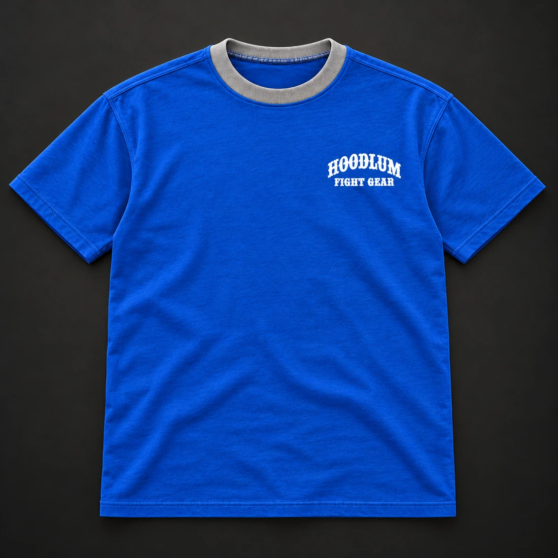 Beyond the Ring Tee — Cobalt / Steel — Flat-lay view (AI demo concept)