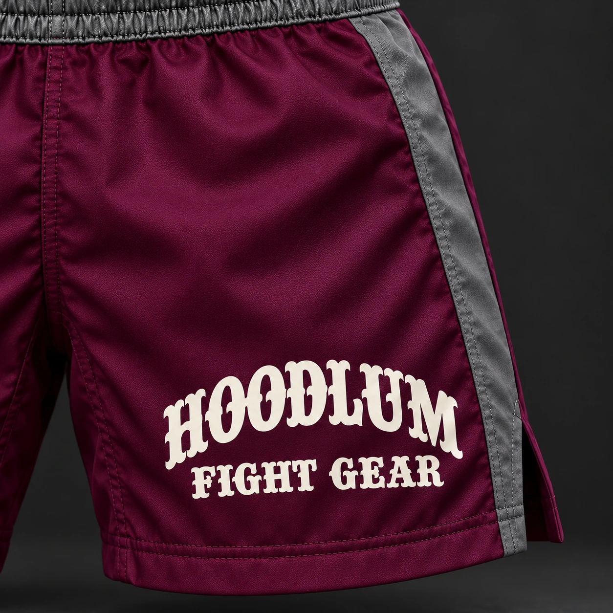 Crimson Corner Shorts — Plum / Pewter — Branding detail (AI demo concept)