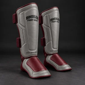 Crimson Shin Guards — Ash / Burgundy — Three-quarter view (AI demo concept)