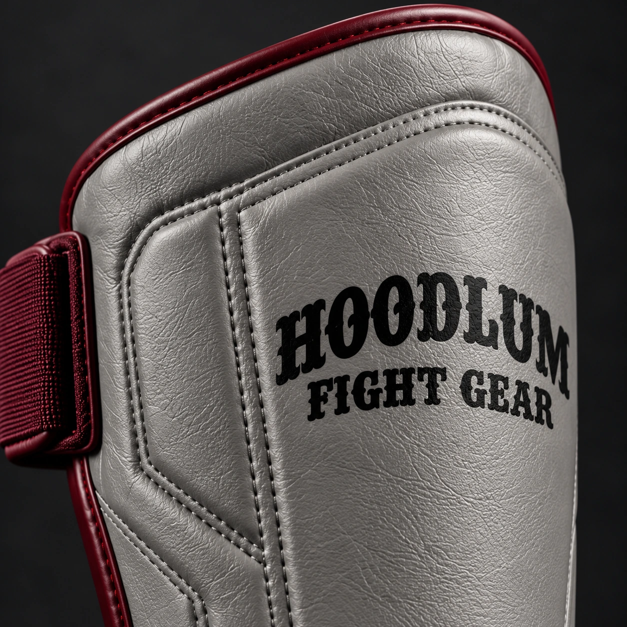 Crimson Shin Guards — Ash / Burgundy — Branding detail (AI demo concept)