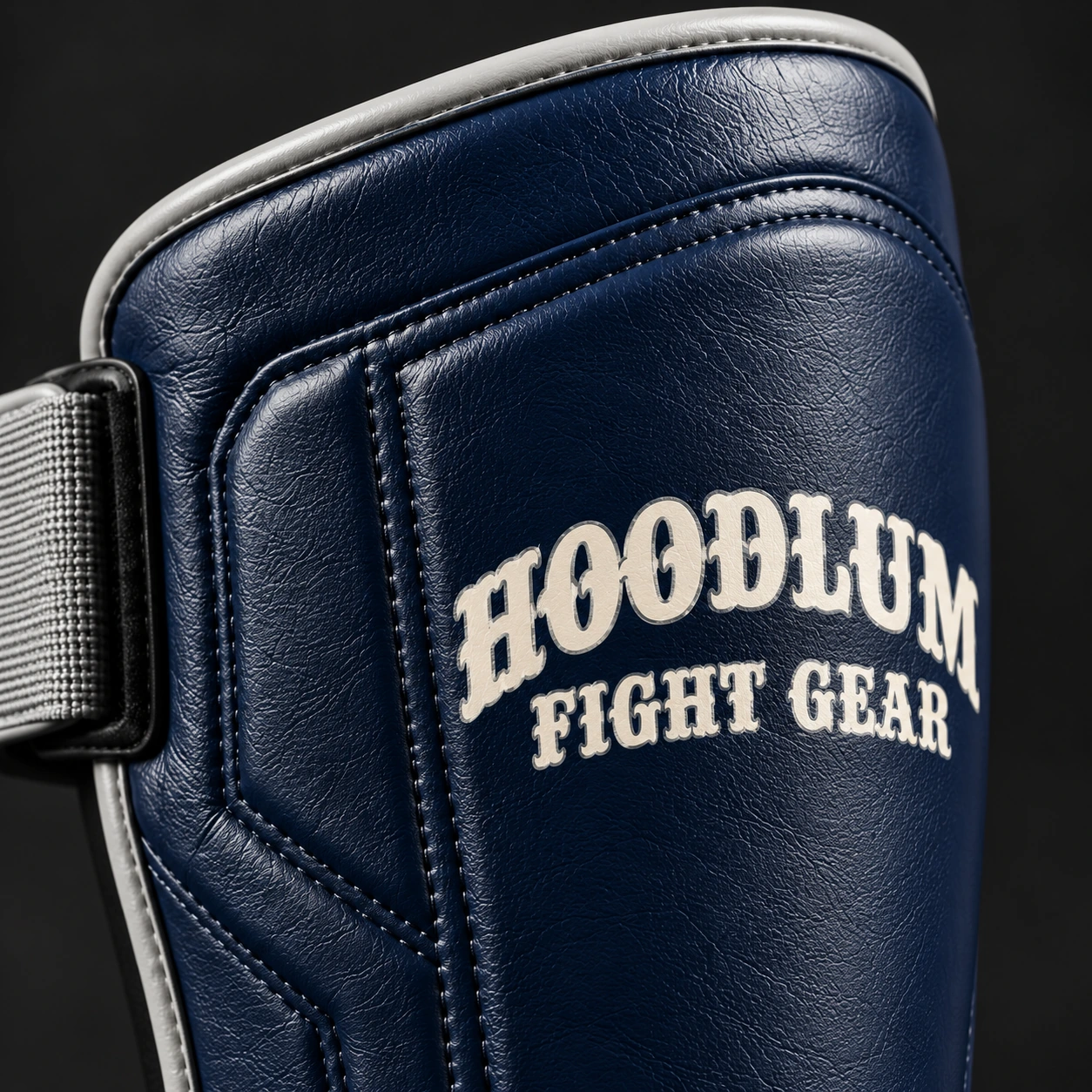 Crimson Shin Guards — Midnight / Ice — Branding detail (AI demo concept)