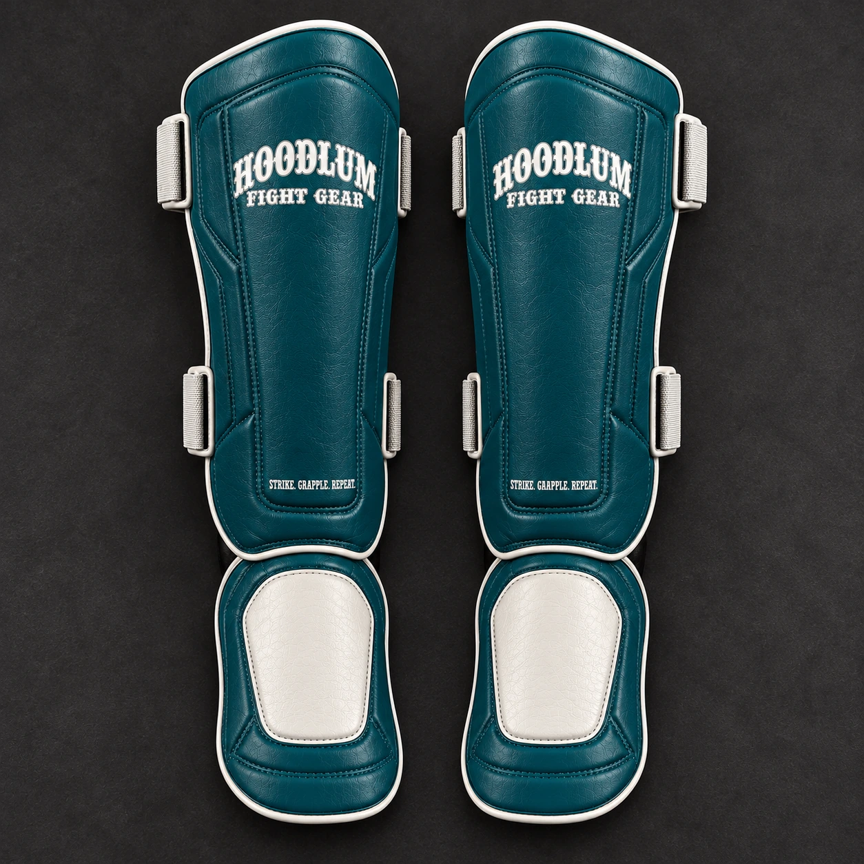 Crimson Shin Guards — Petrol / Chalk — Top view (AI demo concept)