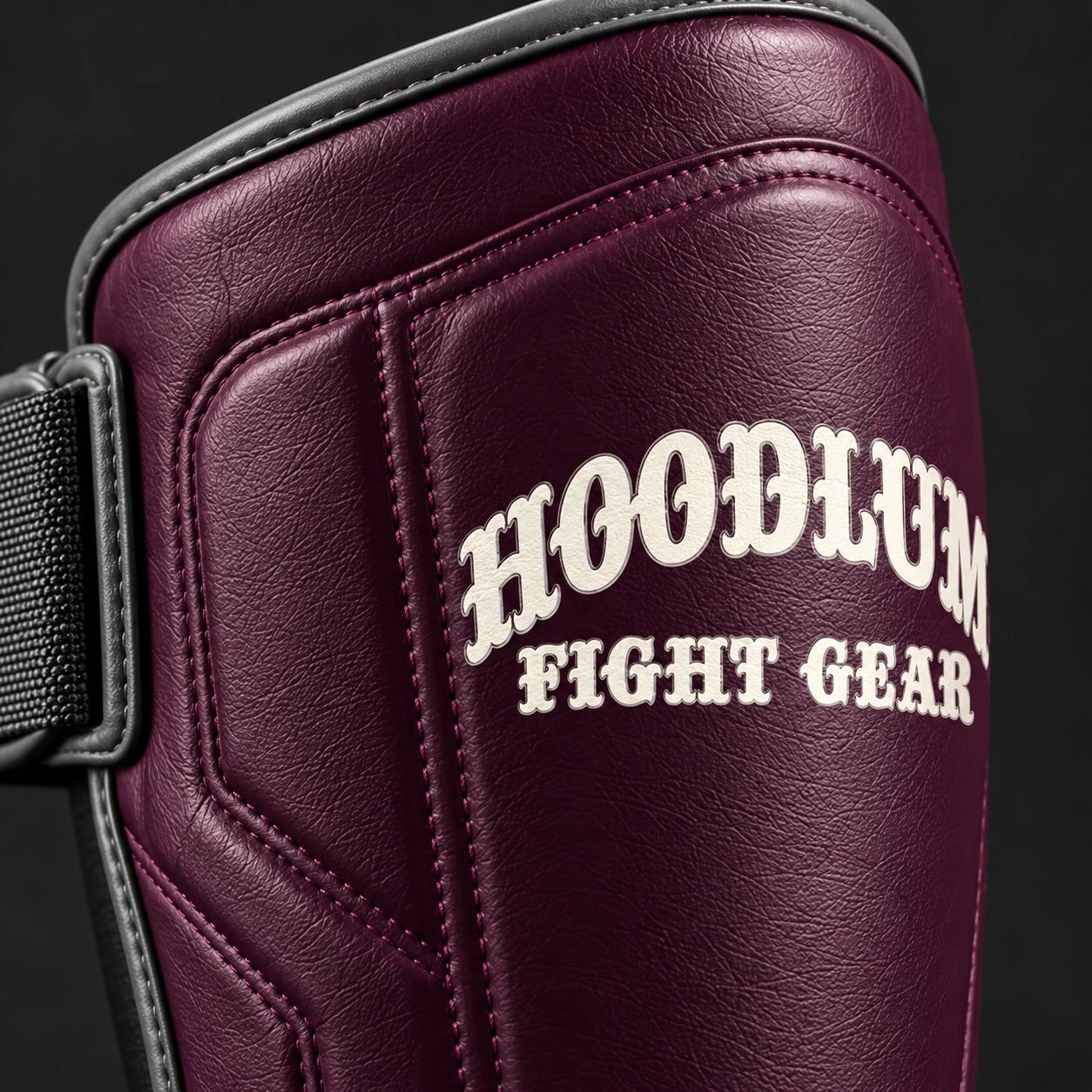 Crimson Shin Guards — Plum / Pewter — Branding detail (AI demo concept)