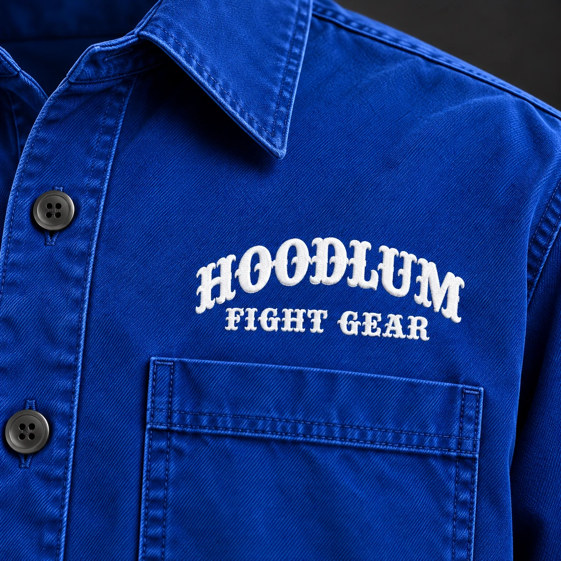 Everyday Fighter Work Shirt — Cobalt / Steel — Branding detail (AI demo concept)