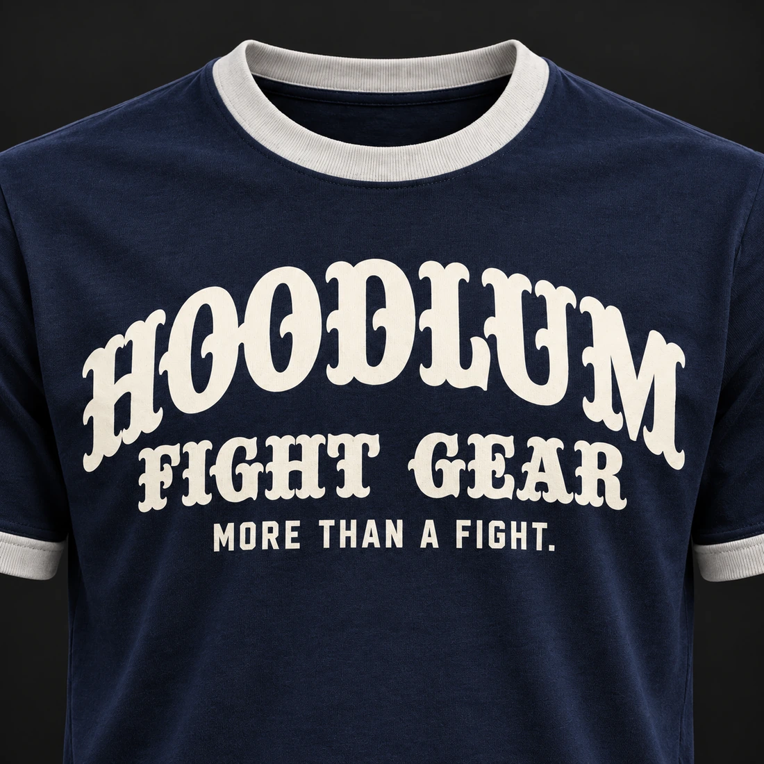 Fight Spirit Ringer Tee — Midnight / Ice — Branding detail (AI demo concept)