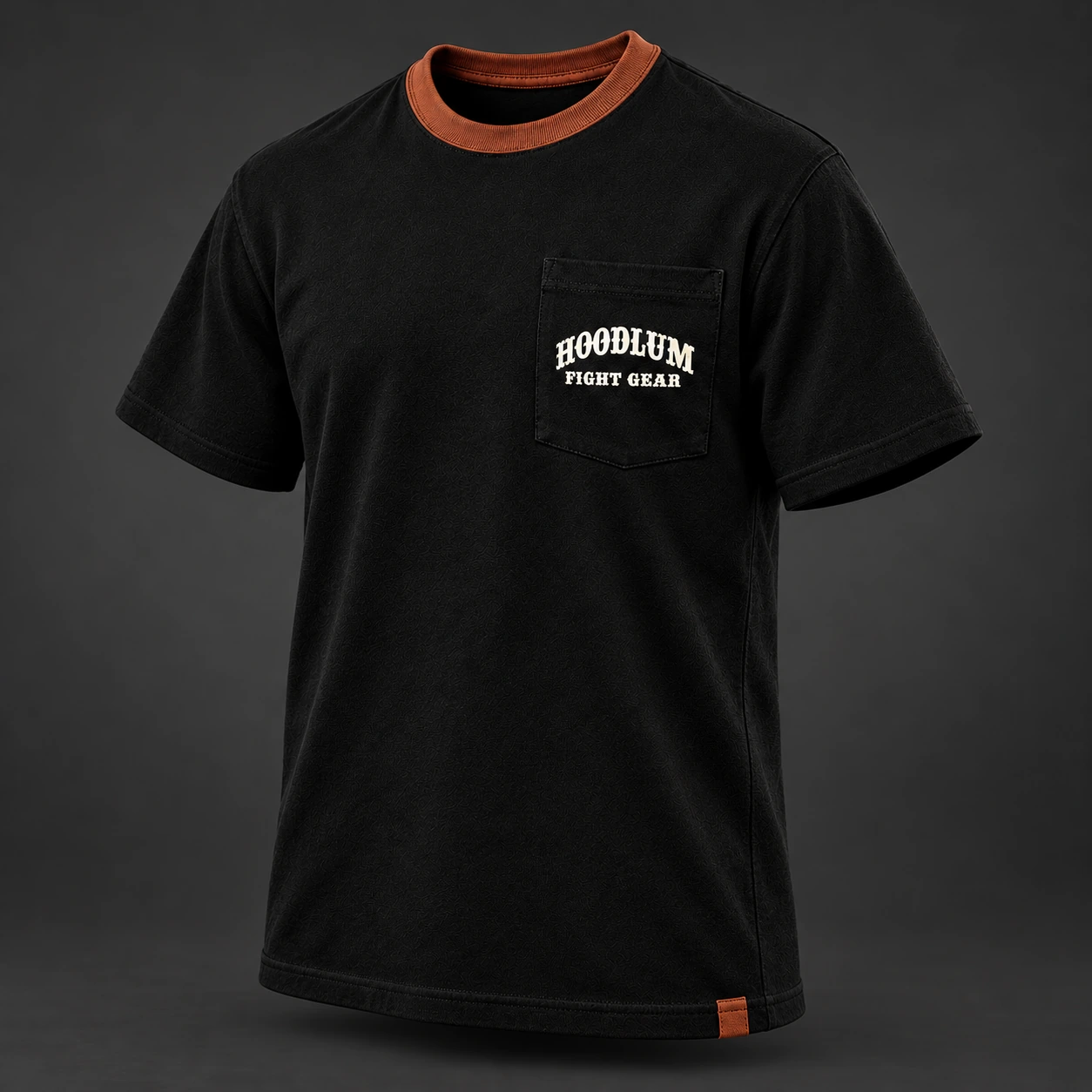 Final Round Pocket Tee — Black / Copper — Three-quarter view (AI demo concept)