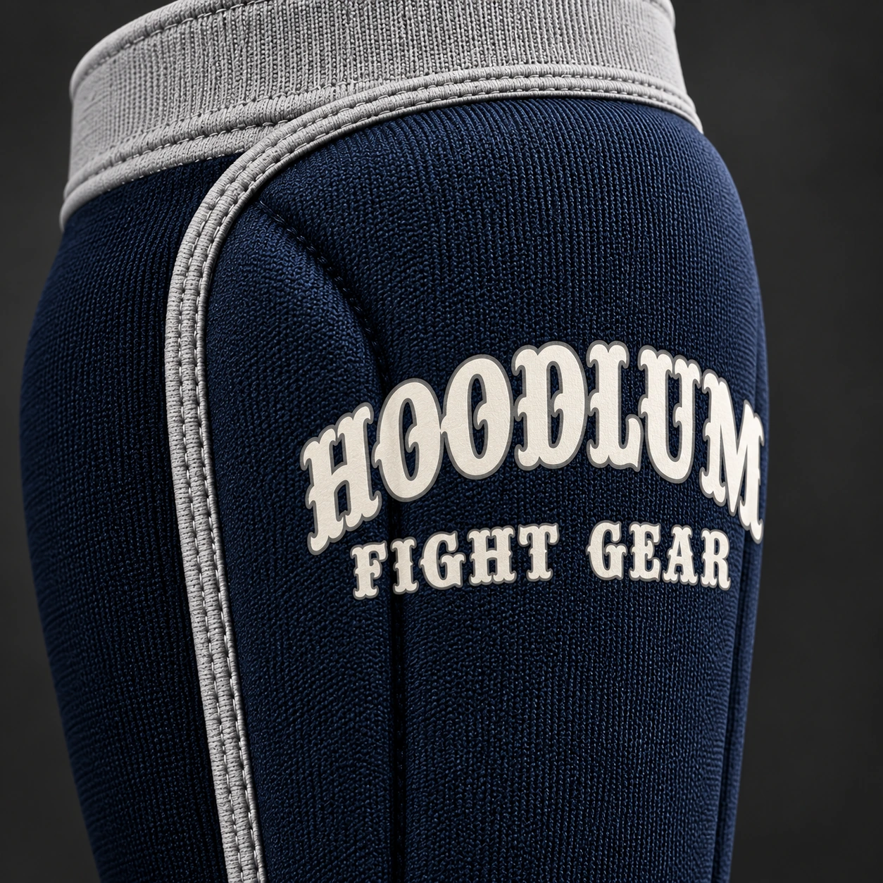 Grappling Shin Sleeves — Midnight / Ice — Branding detail (AI demo concept)
