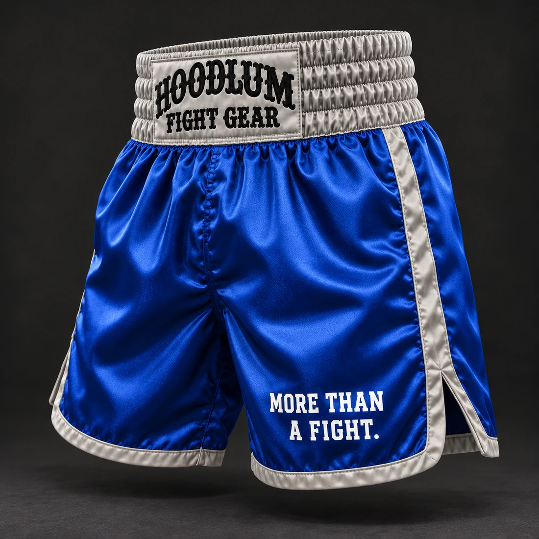 Heritage Satin Boxing Shorts — Cobalt / Steel — Three-quarter view (AI demo concept)