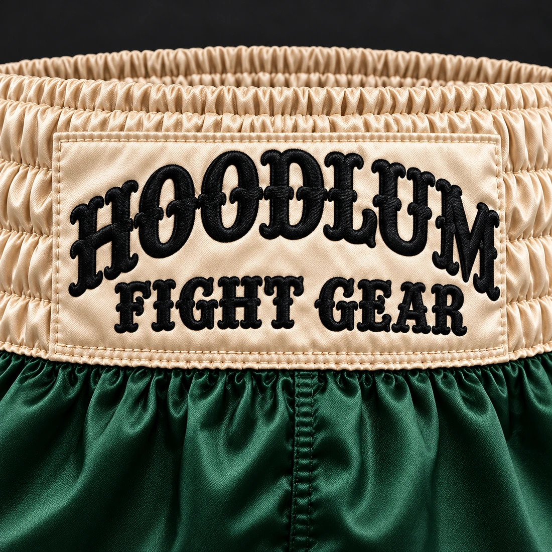 Heritage Satin Boxing Shorts — Forest / Sand — Branding detail (AI demo concept)