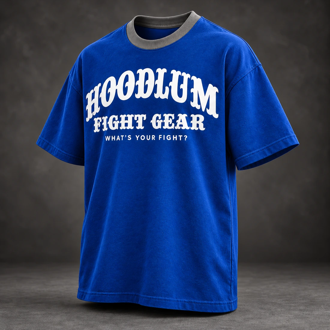 Identity Heavyweight Tee — Cobalt / Steel — Three-quarter view (AI demo concept)