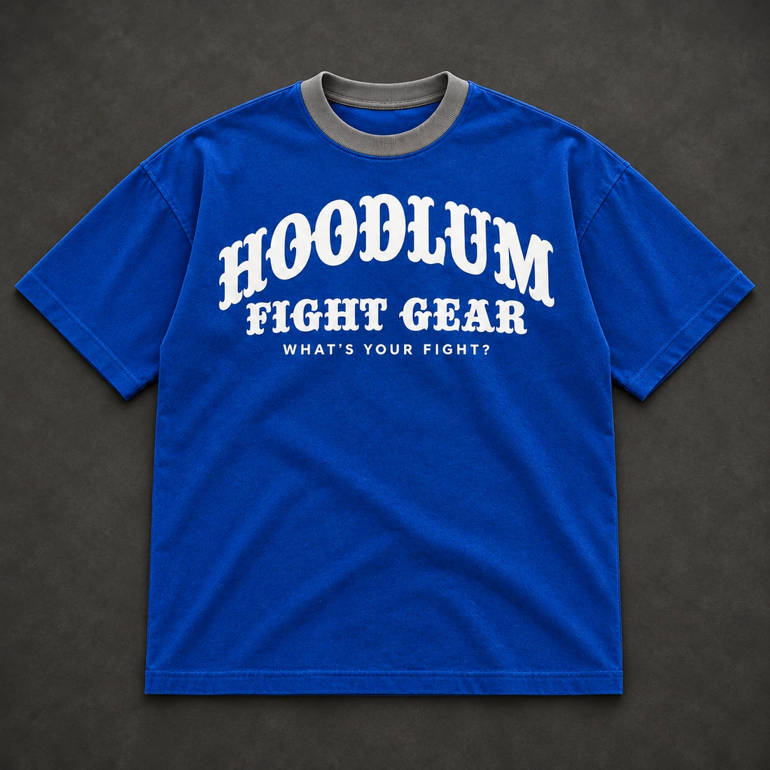 Identity Heavyweight Tee — Cobalt / Steel — Flat-lay view (AI demo concept)