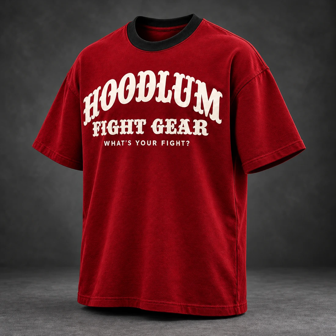 Identity Heavyweight Tee — Crimson / Onyx — Three-quarter view (AI demo concept)
