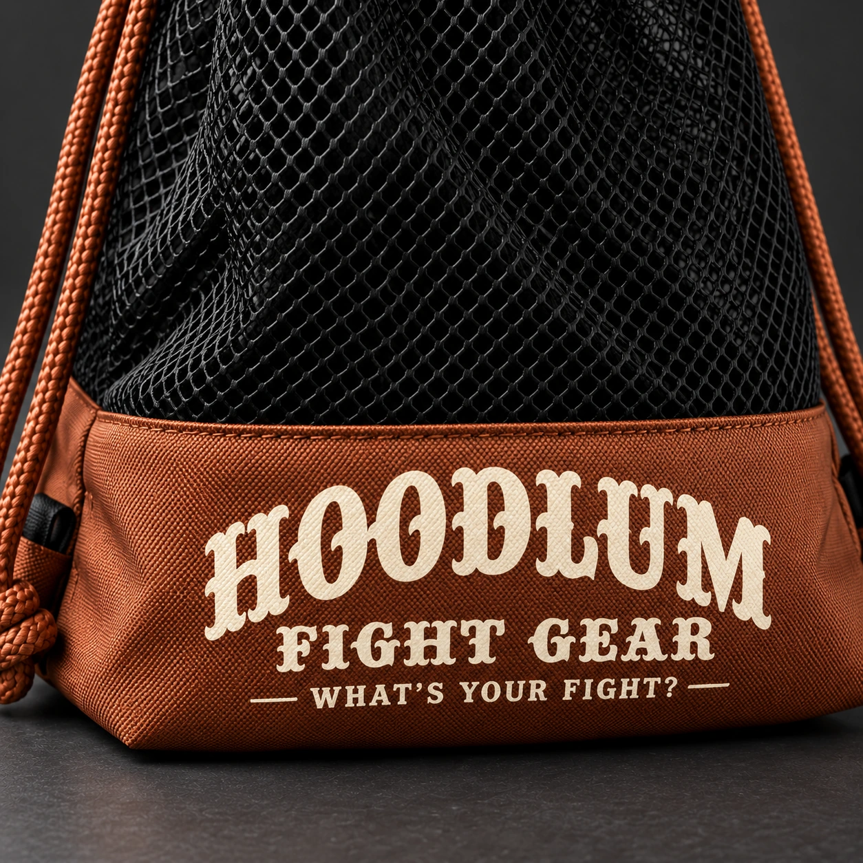 Mesh Gear Bag — Black / Copper — Branding detail (AI demo concept)