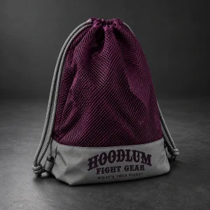 Mesh Gear Bag — Plum / Pewter — Three-quarter view (AI demo concept)