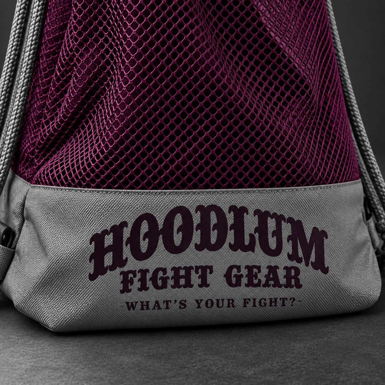 Mesh Gear Bag — Plum / Pewter — Branding detail (AI demo concept)