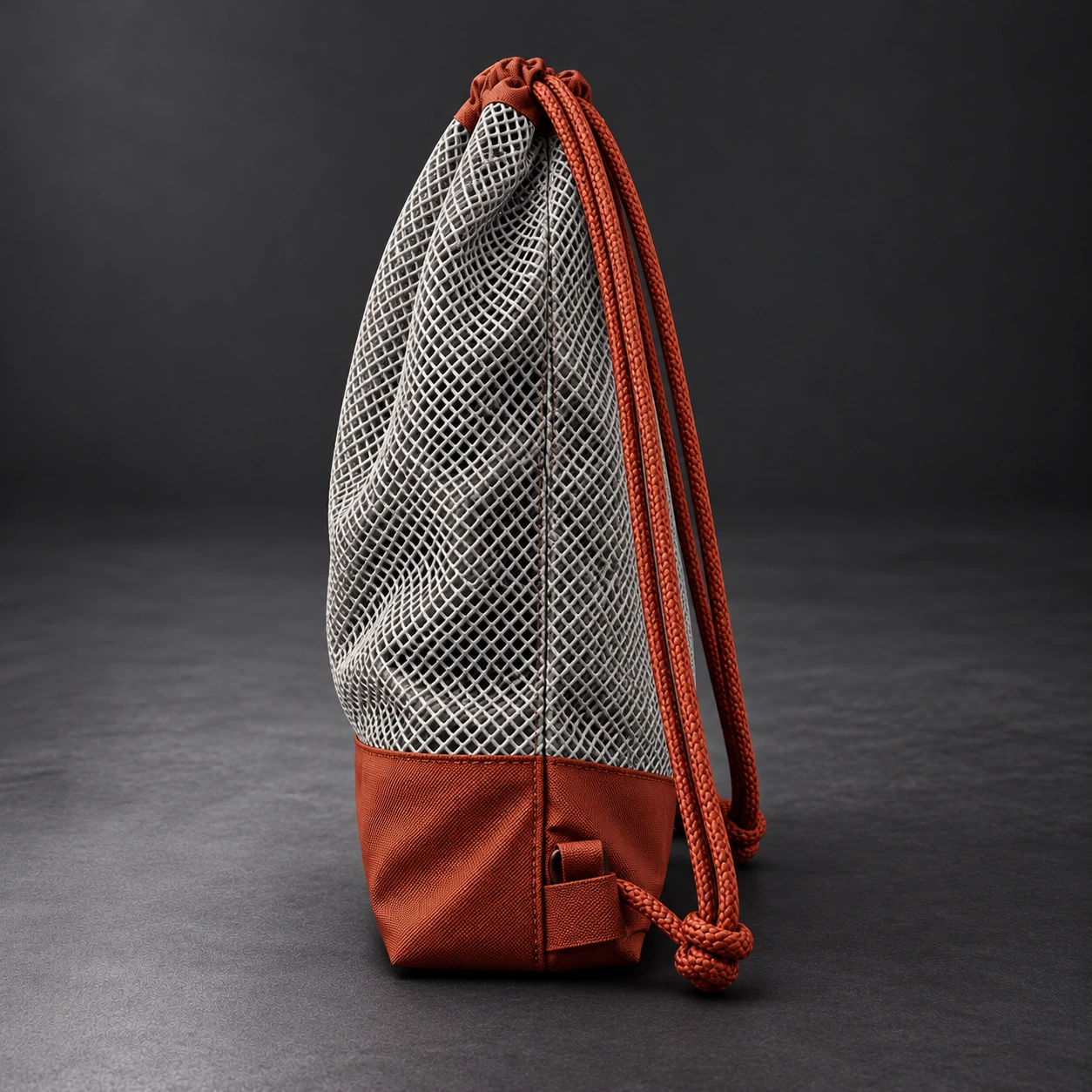 Mesh Gear Bag — Stone / Rust — Opposite-side view (AI demo concept)
