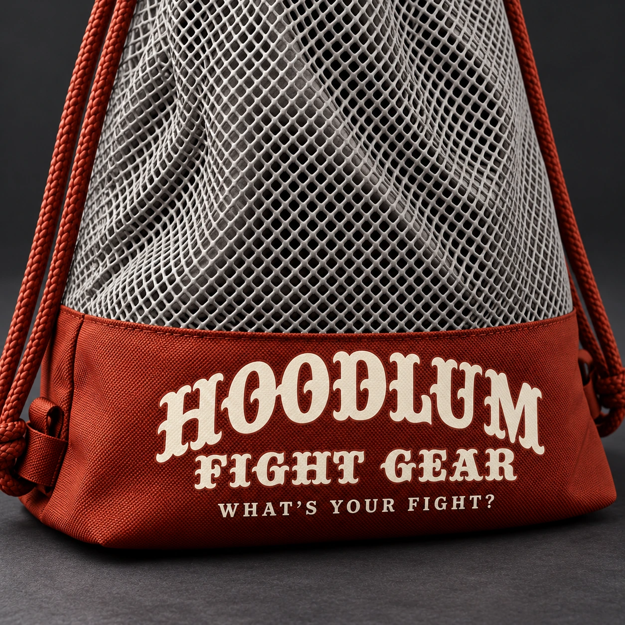 Mesh Gear Bag — Stone / Rust — Branding detail (AI demo concept)