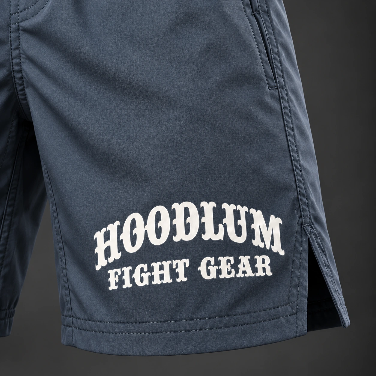 Onyx Fight Shorts — Slate / Glacier — Branding detail (AI demo concept)