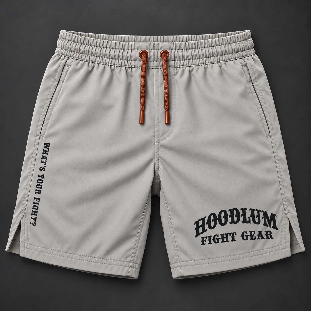 Onyx Fight Shorts — Stone / Rust — Flat-lay view (AI demo concept)