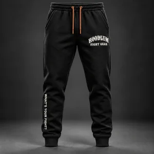 Onyx Identity Joggers — Black / Copper — Front view (AI demo concept)