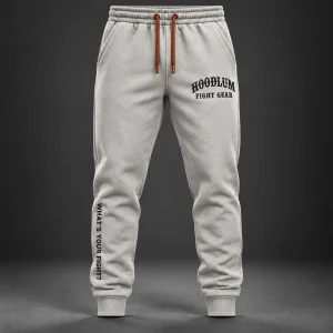 Onyx Identity Joggers — Stone / Rust — Front view (AI demo concept)