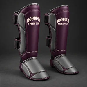 Onyx Shin Guards — Plum / Pewter — Three-quarter view (AI demo concept)