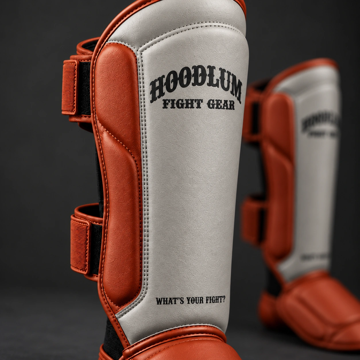 Onyx Shin Guards — Stone / Rust — Branding detail (AI demo concept)
