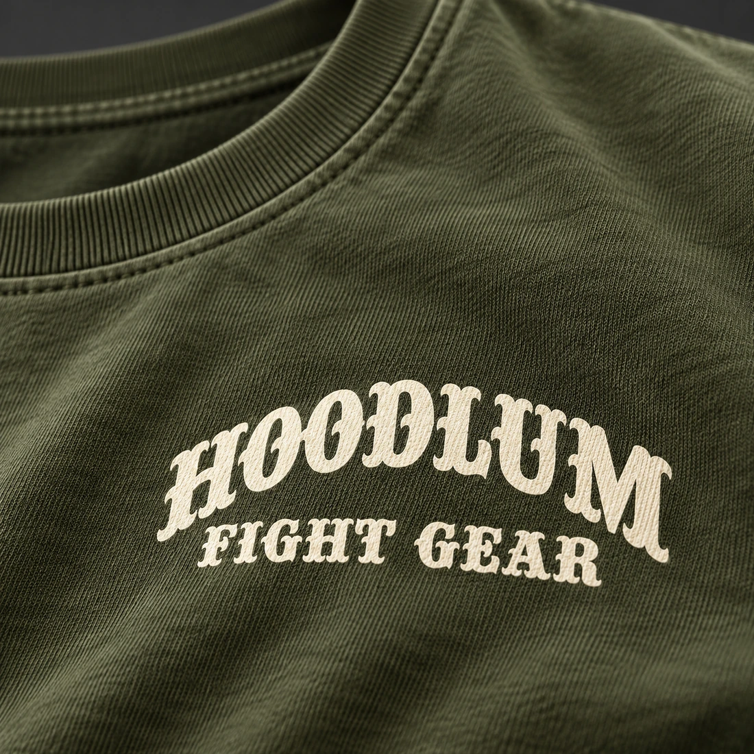 Silent Courage Tee — Olive / Carbon — Branding detail (AI demo concept)
