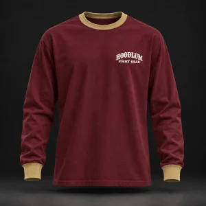 Story Long Sleeve Tee — Oxblood / Brass — Front view (AI demo concept)