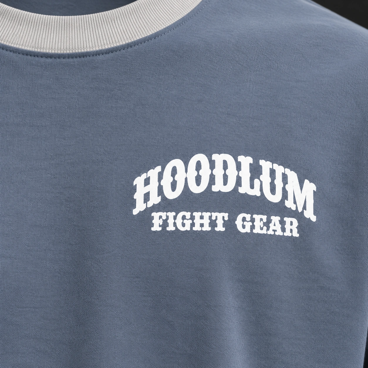 Story Long Sleeve Tee — Slate / Glacier — Branding detail (AI demo concept)