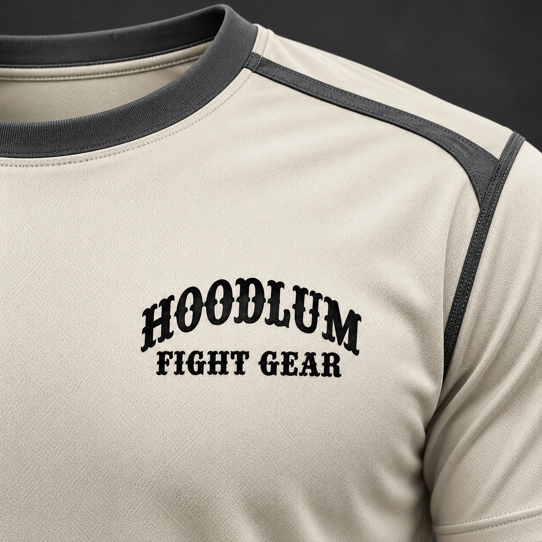 Three Disciplines Tee — Bone / Graphite — Branding detail (AI demo concept)